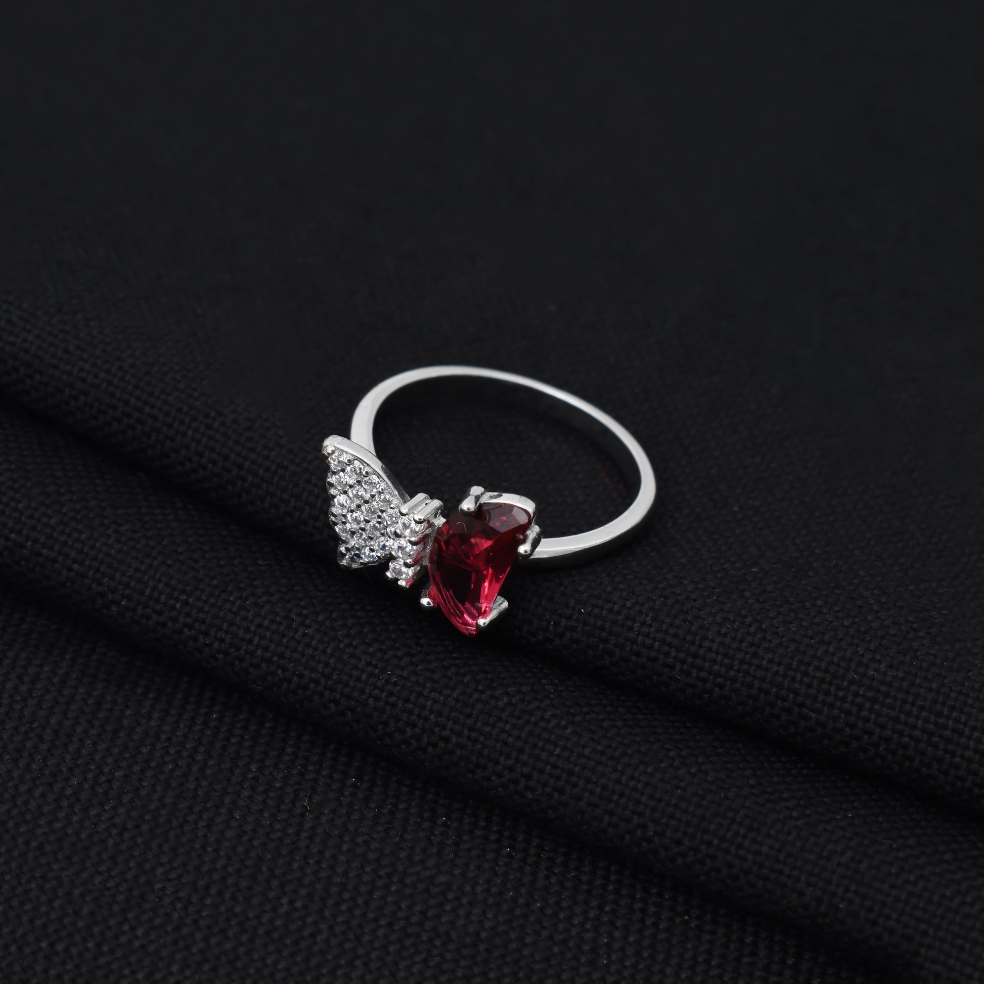 Beautiful pink butterfly stone ring in sterling silver.