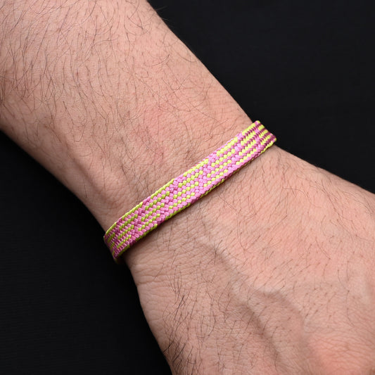 Chic silver moli bracelet featuring casual pink and green knitted thread design for a playful look