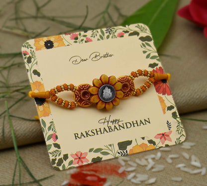 Silver Center Ganesh Ji with Wooden Theme Flower Design Rakhi for Boys