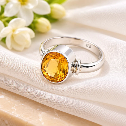 Elegant Sterling Silver Ring with a Beautiful Yellow Sapphire