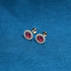 Stylish silver earrings with vibrant pink stone studs