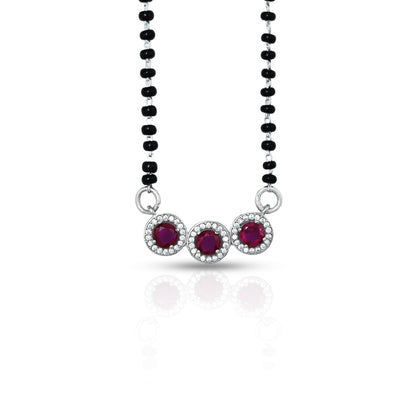 Beautiful mangalsutra with black beads, complemented by vibrant purple round gemstones