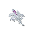 Elegant silver flower saree pin adorned with purple stones