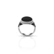 Elegant sterling silver ring featuring a round black resin inlay, designed for a minimalist and bold style.