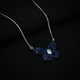 Delicate silver pendant featuring a butterfly design with a blue stone.