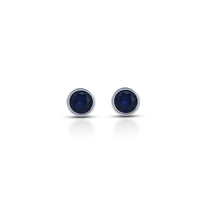 Trendy sterling silver earrings featuring round blue stones