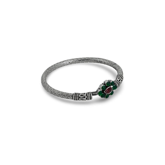 Silver boys' kada featuring a leaf design with simple lining details