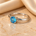 Blue Topaz Round Shaped Sterling Silver Ring