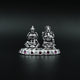 Intricate silver figurine of Lakshmi and Ganesha featuring purple and white gems (Diwali)