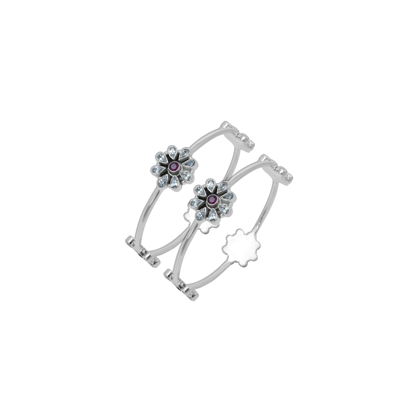 Exquisite silver kada with a flower design and embedded gemstones