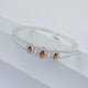 Elegant Silver Bracelet with Trio of Orange Stones for Girls.