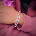 Elegant Silver Bracelet with Trio of Orange Stones for Girls.