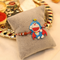 Silver Rakhi with Doraemon Charm