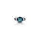 Stylish silver ring with oval light blue gemstone.