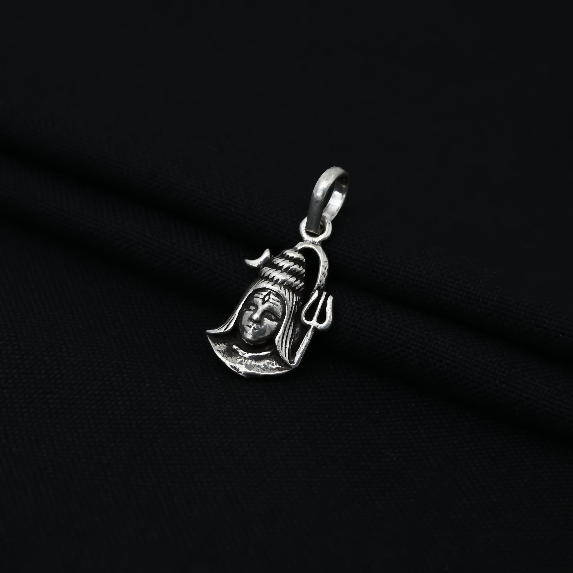 Charming sterling silver pendant with Shiv Ji and Trishul design, representing courage and faith