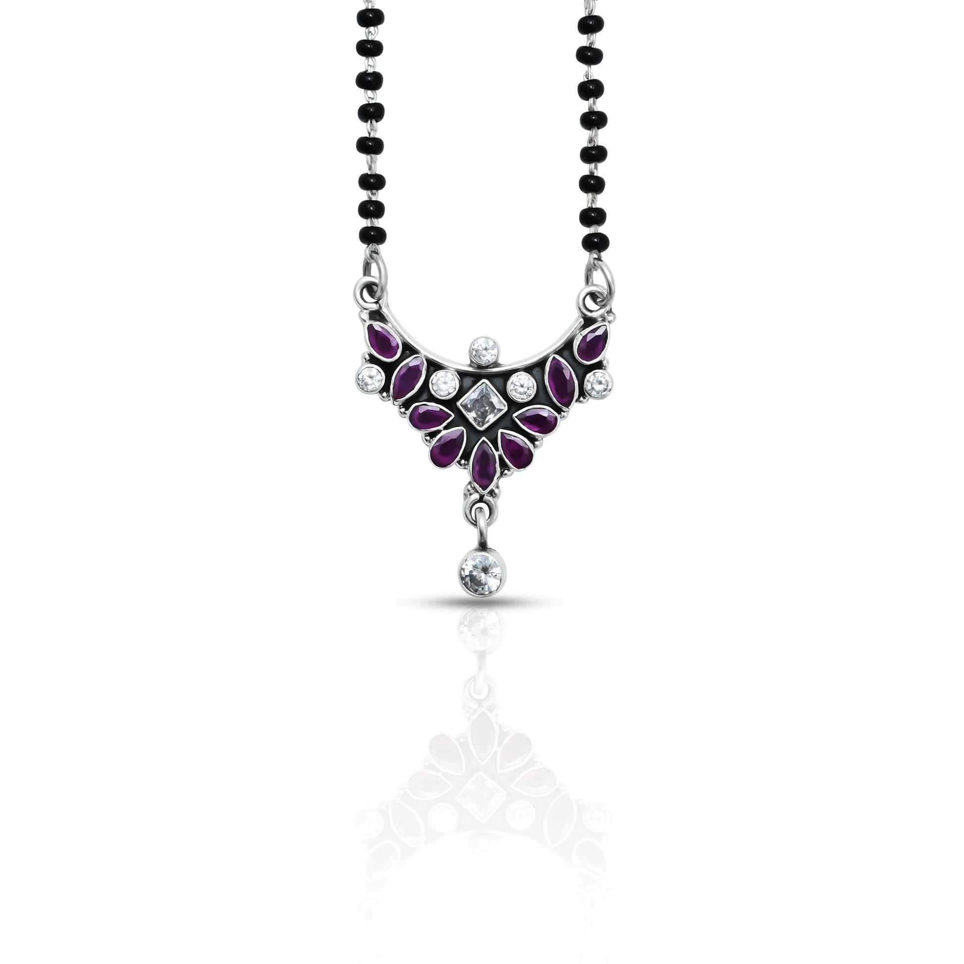 Elegant sterling silver mangalsutra featuring a bold pink gemstone for a striking look