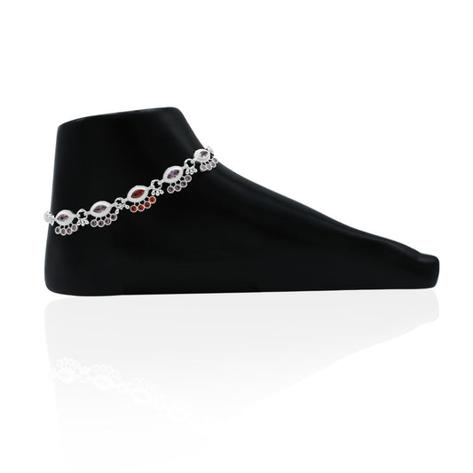 Silver anklet featuring a design of colorful evil eye accents