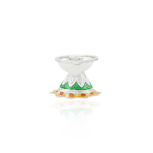 Exquisite silver deepak with a beautiful design, perfect for lighting during pooja rituals.