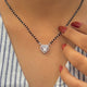 Beautiful black beads mangalsutra with heart-shaped pendant.