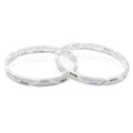 Silver bangles adorned with glamorous colorful gemstones