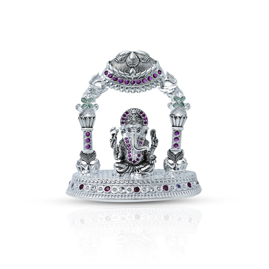 Divine silver Ganesha murti adorned with multicolour stones