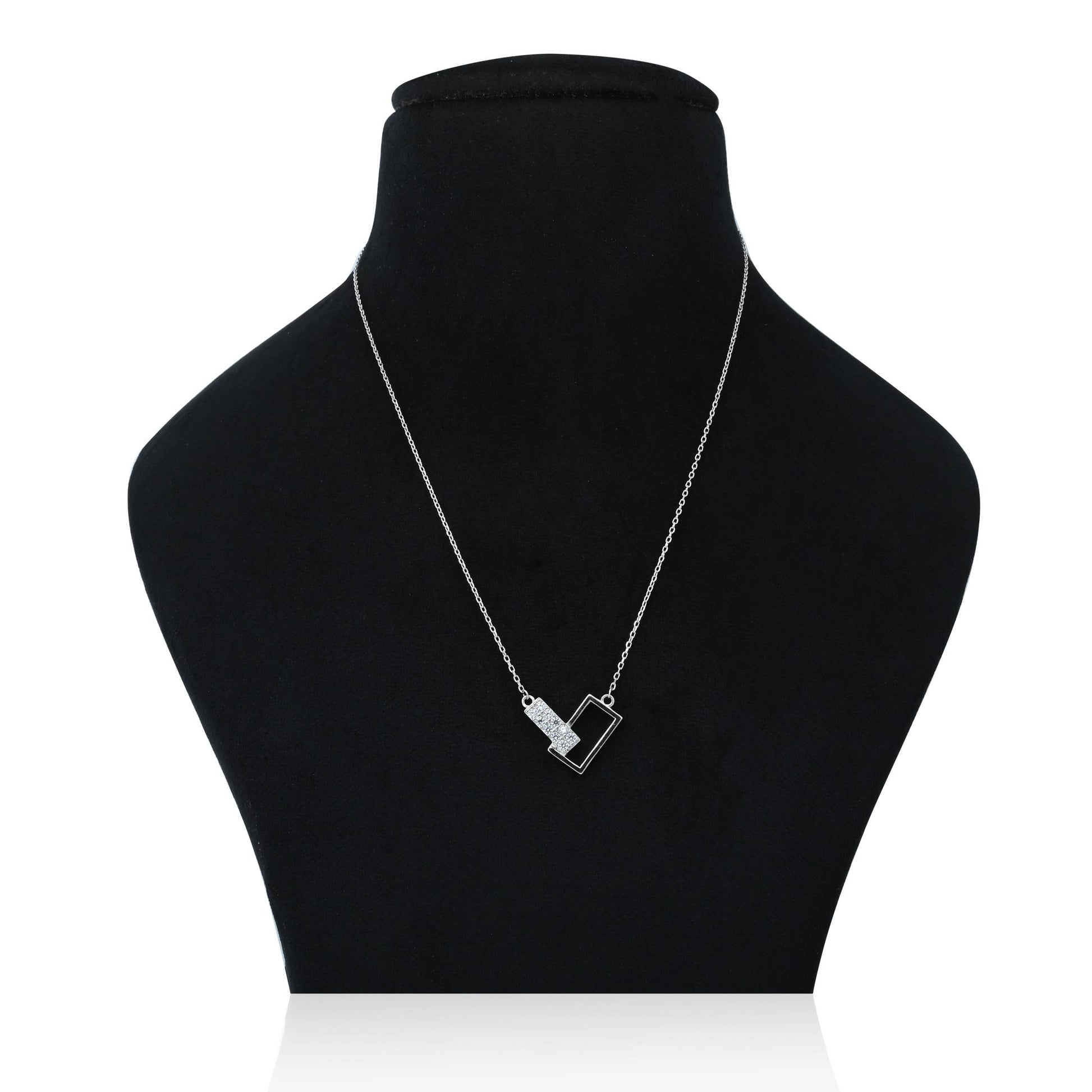 Trendy sterling silver intersecting rectangle pendant on chain.