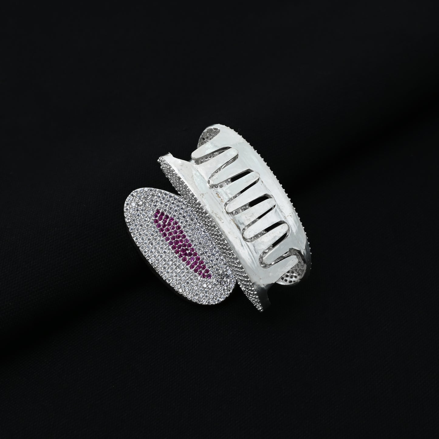 Stylish girls' silver clutcher adorned with purple and CZ gems