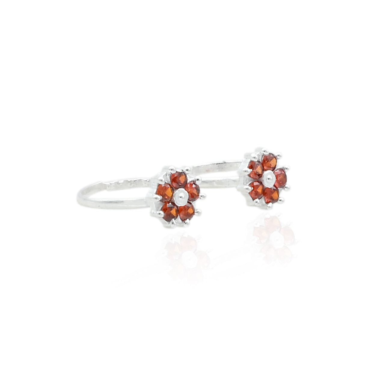 Stylish silver toe rings with eye-catching orange flower motifs, perfect for adding a pop of color