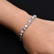 Sterling silver bracelet featuring a protective evil eye and flower design