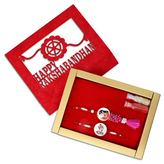 Boys' Rakhi featuring a silver Raja Rani design with a pink theme, kumkum, and rice.