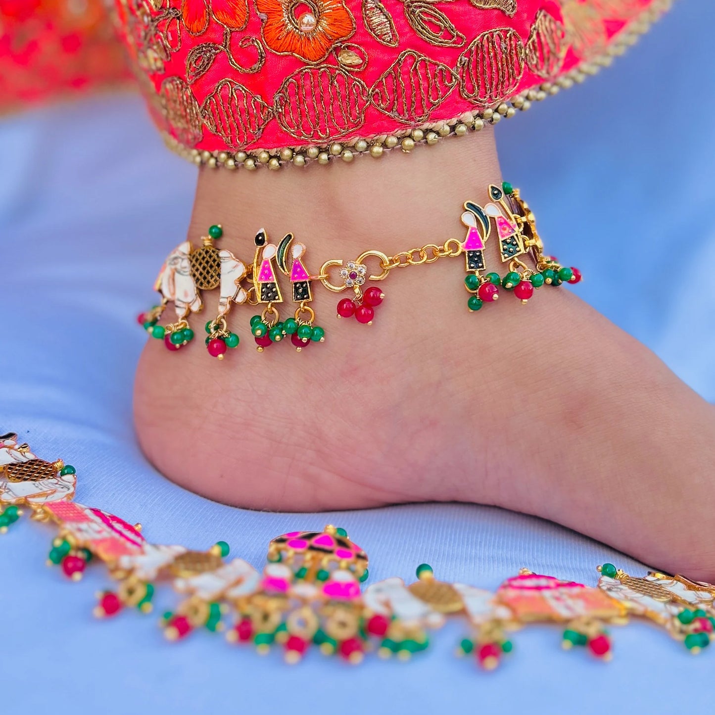 Vibrant silver payal with charming elephant and umbrella.