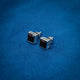 Elegant sterling silver stud earrings with a simple square black stone design