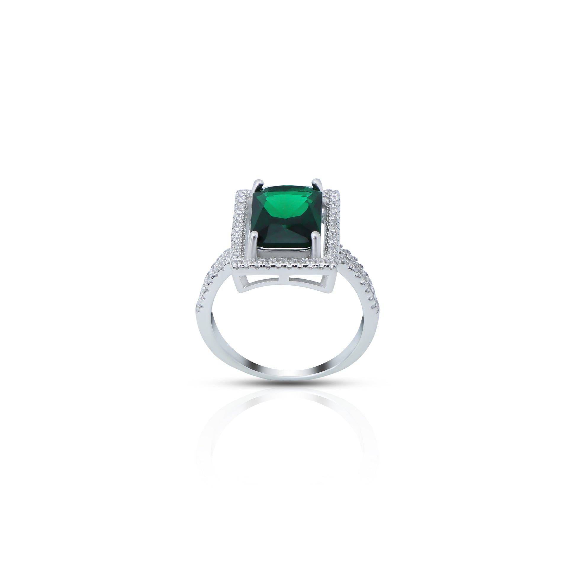 Elegant silver ring featuring a vibrant emerald.