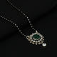 Timeless black beaded mangalsutra with a stunning pendant of green and white gemstones