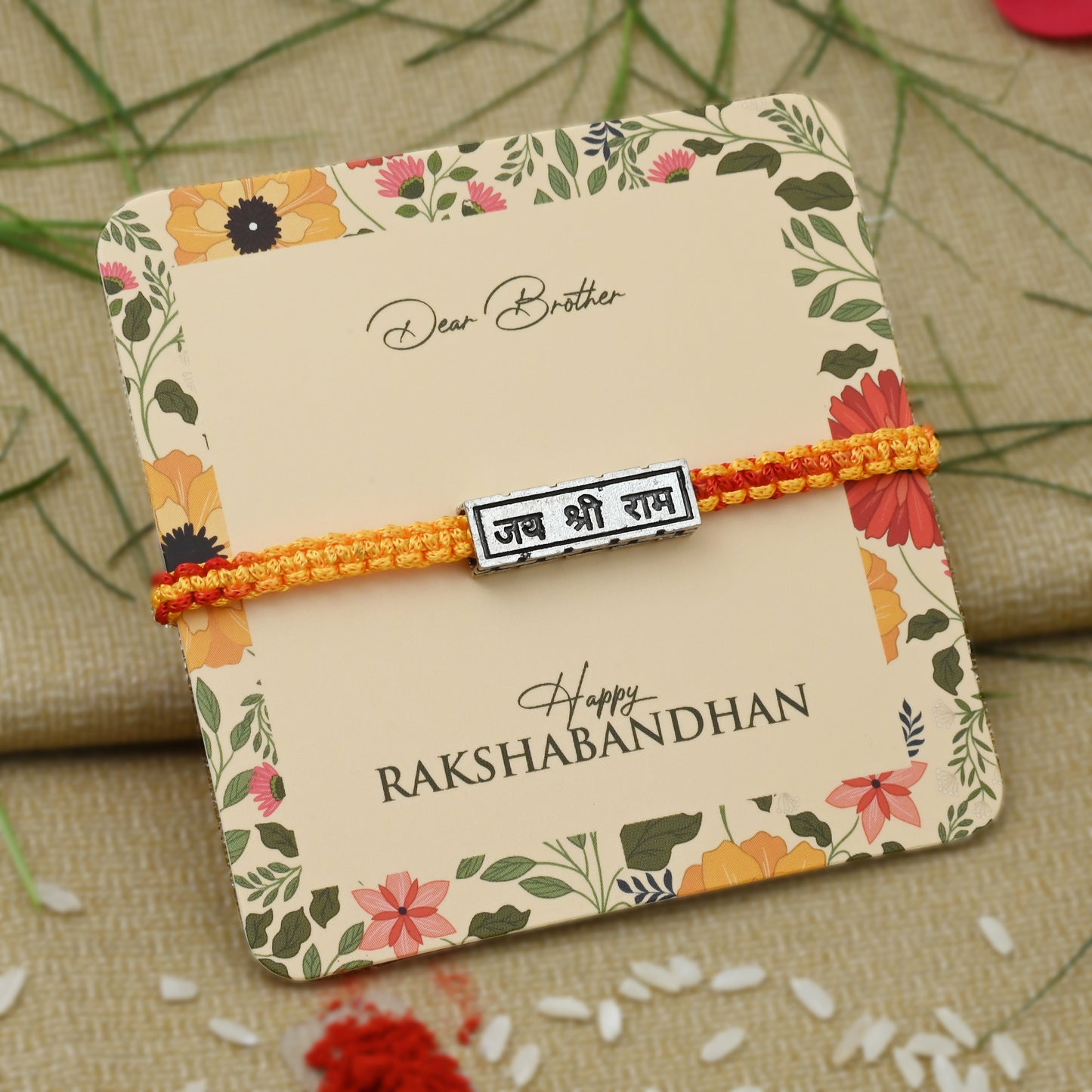 Silver Rakhi with 'Jai Shree Ram' written in elegant script, perfect for boys.