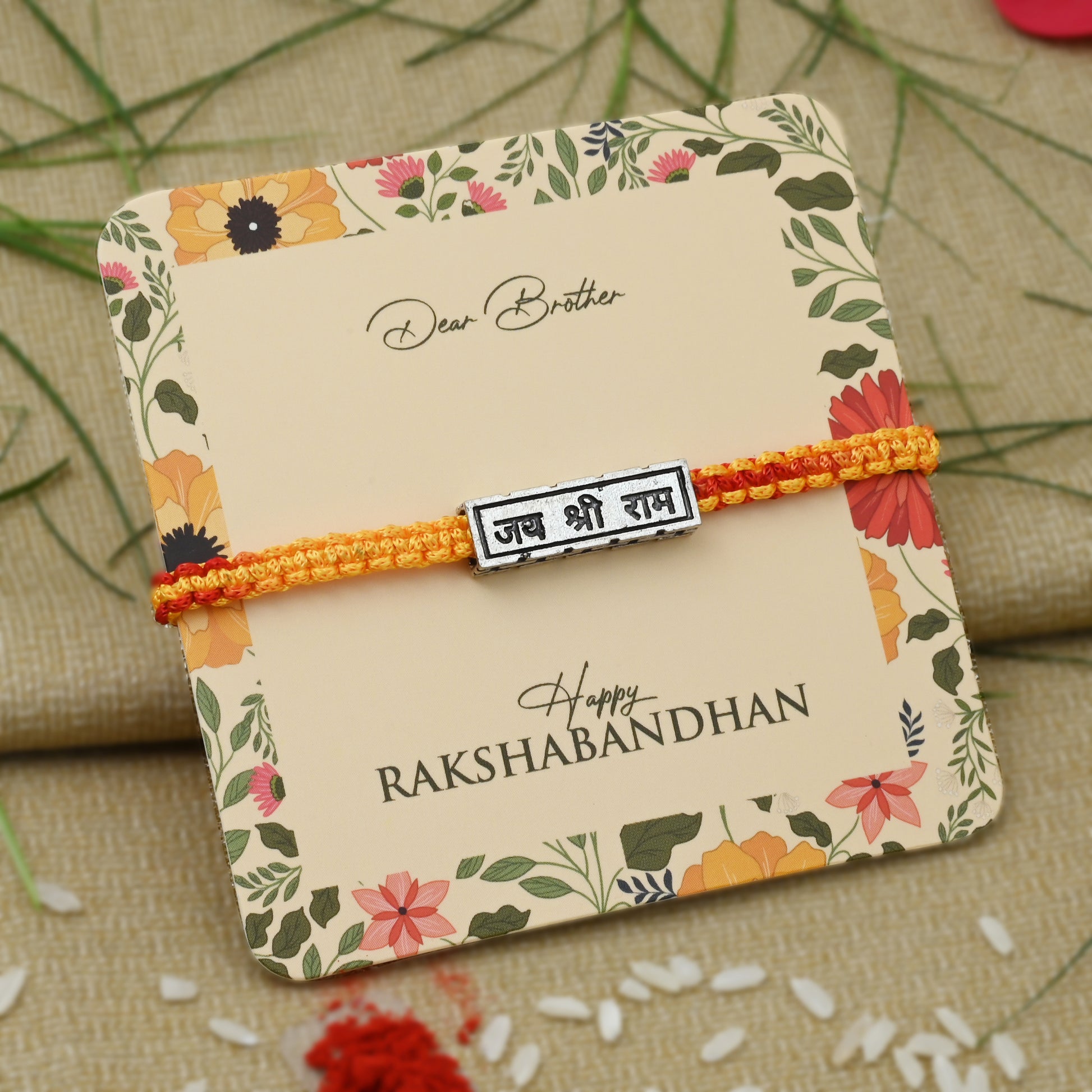 Silver Rakhi with 'Jai Shree Ram' written in elegant script, perfect for boys.