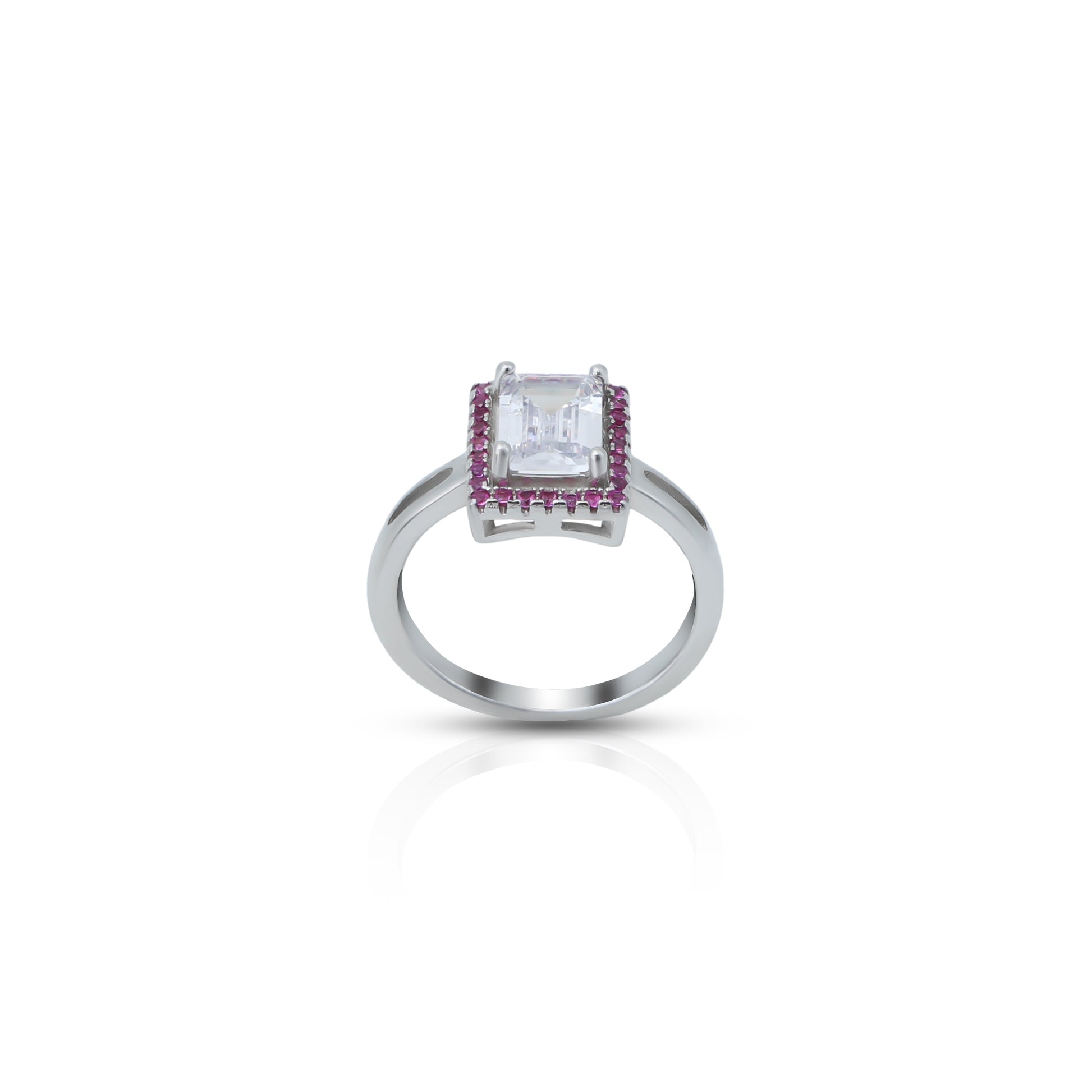 Elegant silver ring featuring emerald cut diamond.