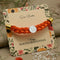 Silver Center Swastika with Orange Tangle Moli Rakhi for Boys
