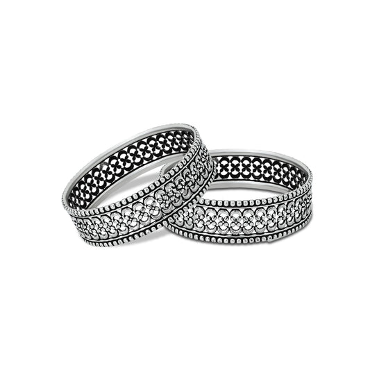 Pure silver bangles for girls, offering a sleek and elegant accessory to complement any outfit.