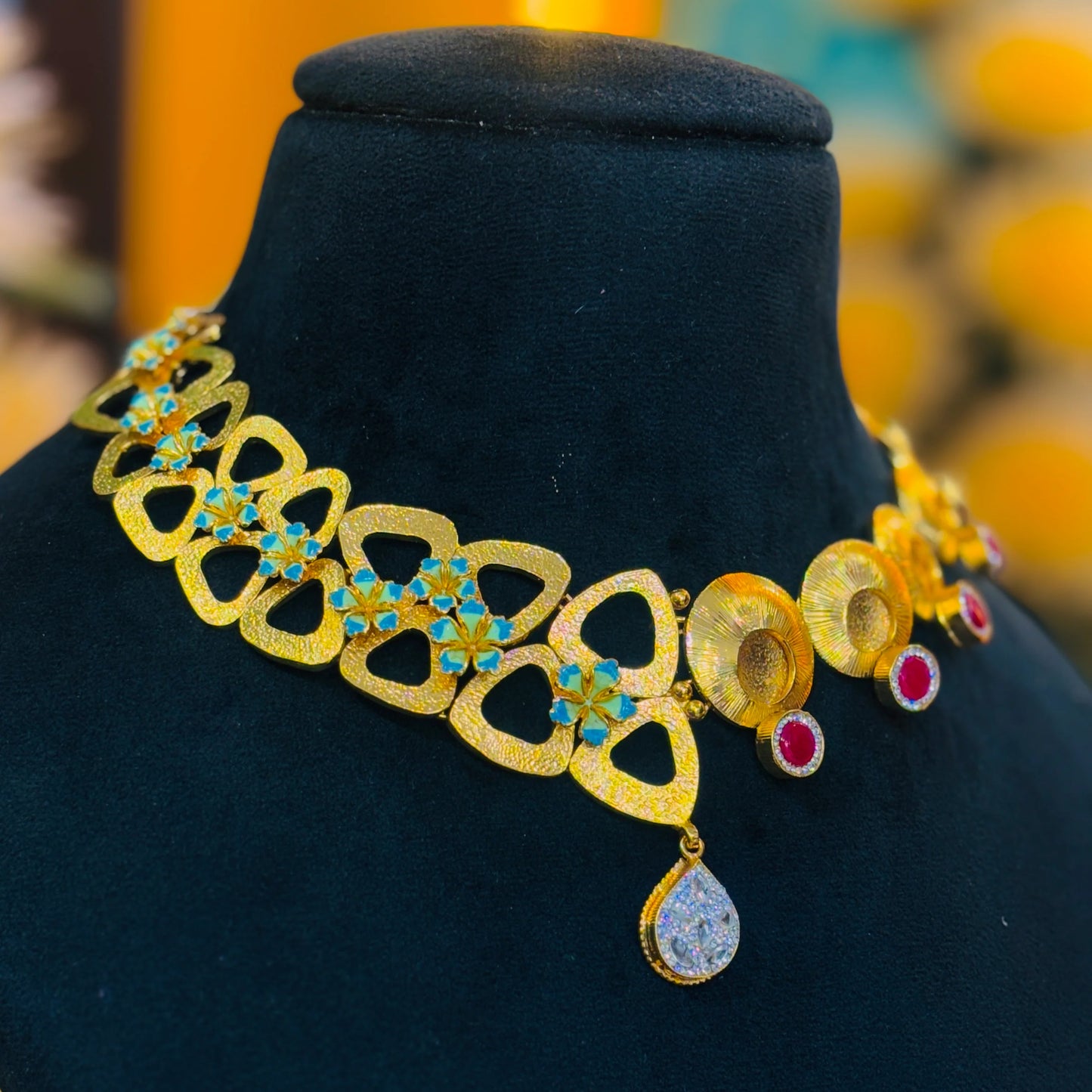 Radiant Gold Polish Silver Necklace with Delicate Small Flowers and a White Crystal Center.