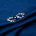 Elegant Silver Toe Ring with Floral Accent red stone