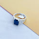 Sleek Silver Ring for Men with a Bold Blue Stone