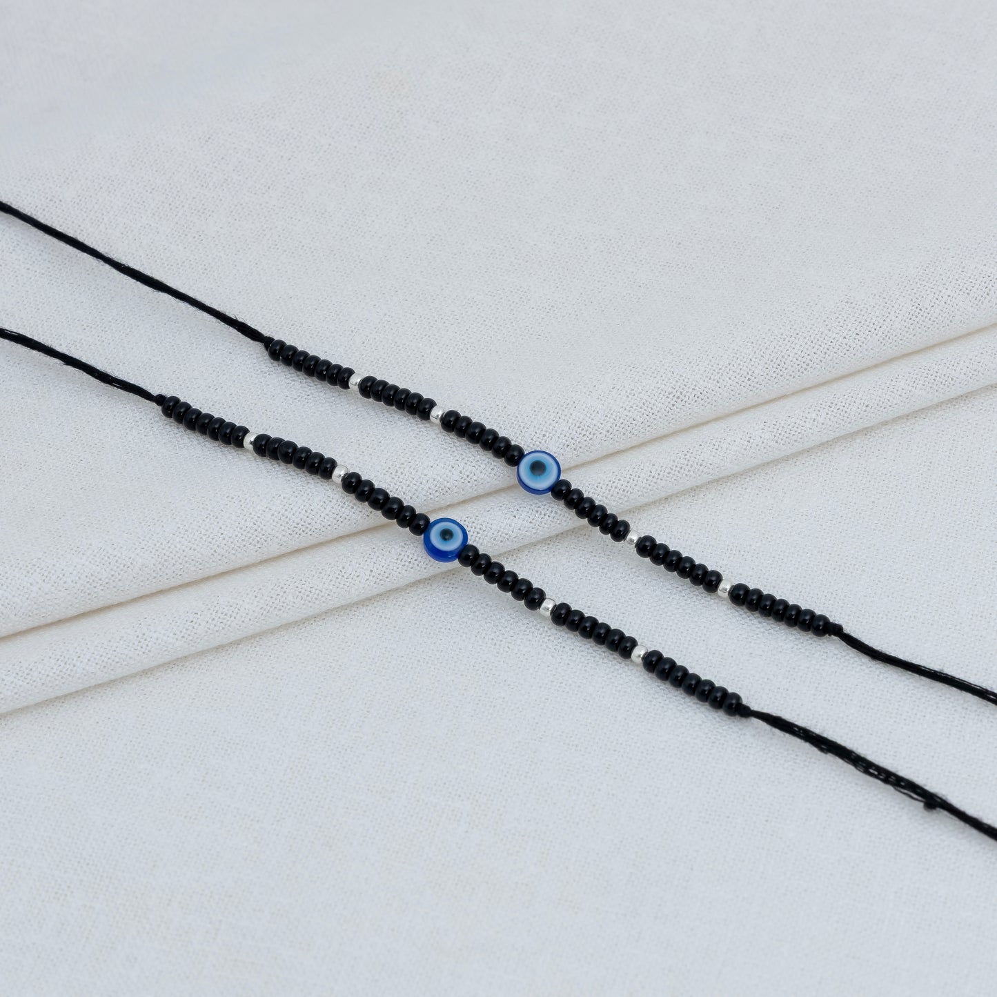 Black Beads Evil Eye Bracelet with Silver Accents