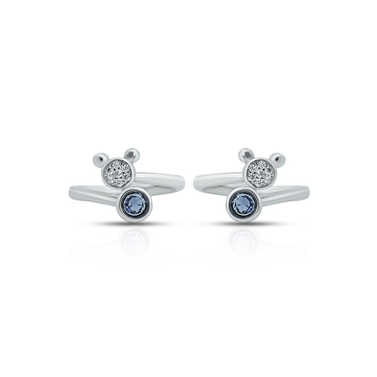 Elegant silver toe ring featuring round blue and white gemstones