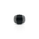 Modern men's silver ring featuring a bold black onyx stone with unique textured detailing.