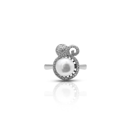 Close-up view of a sterling silver 'Shining Glory' designer pearl ring for girls, featuring a lustrous pearl centerpiece.