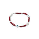 Trendy silver bracelet adorned with red beads and a bold evil eye motif