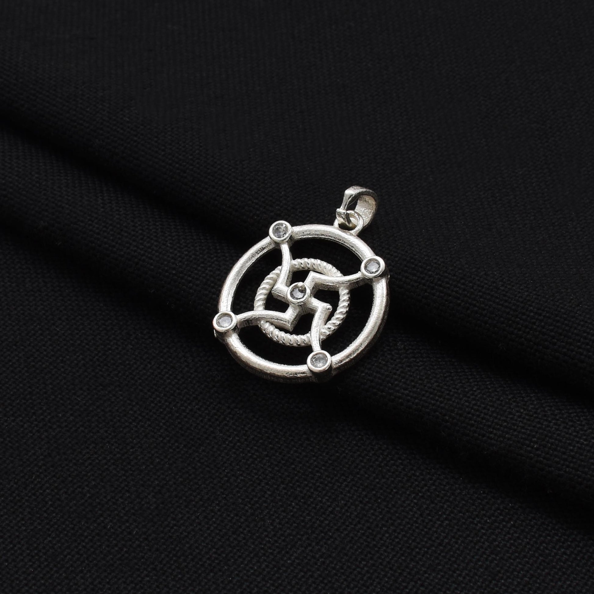 Charming silver pendant showcasing the Swastik sign for positive energy