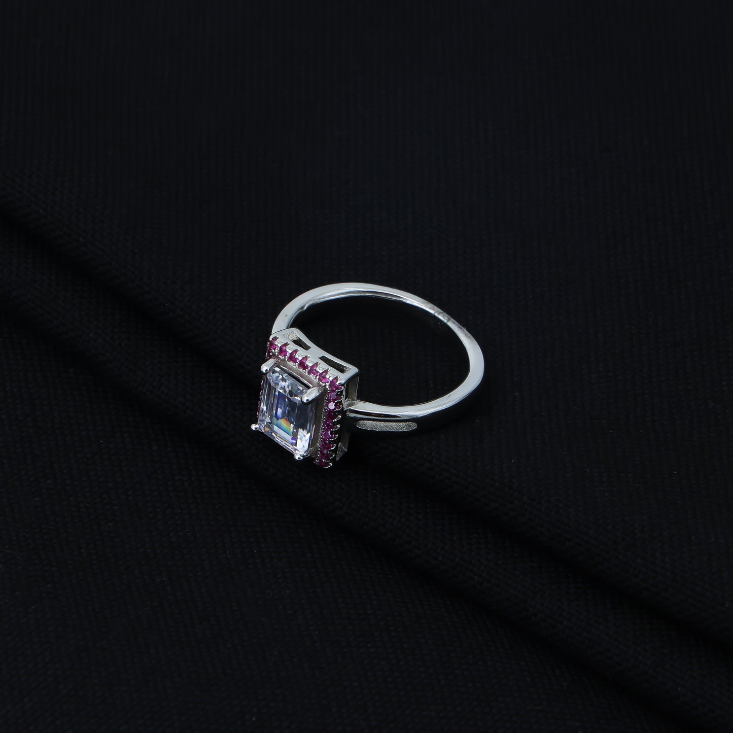 Stunning emerald cut American diamond in silver ring.