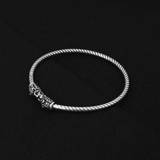 Stylish silver boys' kada showcasing a detailed lion face symbol